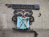 a coat of arms on the side of a building