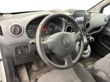 the interior of a car with a steering wheel and dashboard controls