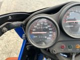 a close up of a speedometer on a motorcycle