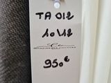 a price tag on a white dress hanging from a hanger