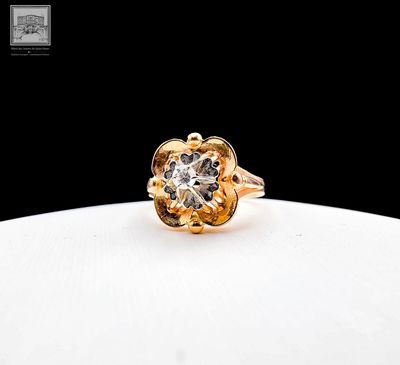 an image of a diamond ring on a white plate