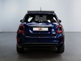 the rear end of a blue car with a license plate on it