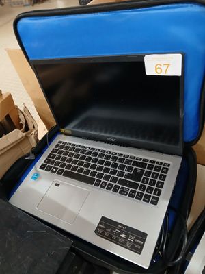 a laptop that is sitting in a case on the floor
