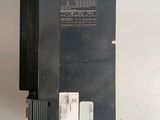 a close up of an electronic device on a white surface