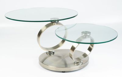 two round glass tables with metal bases on a white background