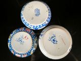 three plates that are sitting on a table