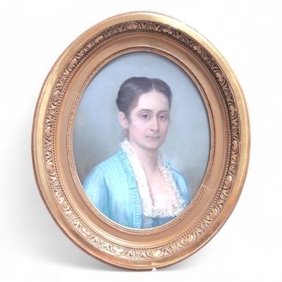 portrait of a woman in a blue dress in a gold frame
