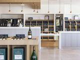 bottles of wine are on display in a wine shop