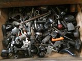 a wooden box filled with assorted tools and tools