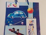a blue shopping bag with a picture of a car on it