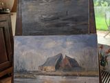 un tableau représentant une grange, posé sur un chevalet dans un salon