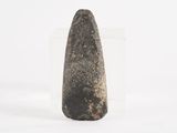 an image of a stone object on a white surface