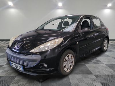 a picture of a black car parked in a garage