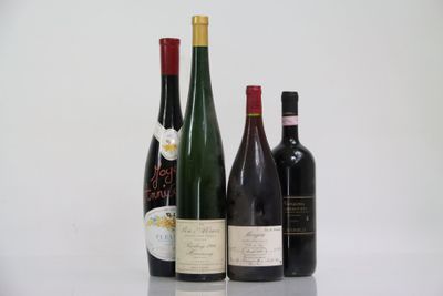 three bottles of wine are lined up on a table
