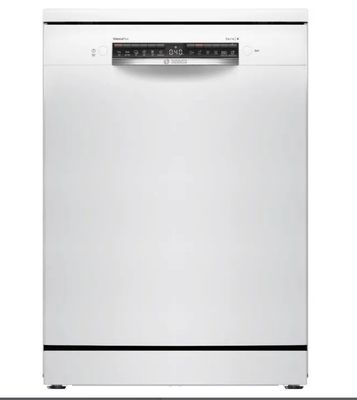 un lave-vaisselle blanc posé sur un comptoir blanc