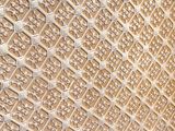 a close up of a wall that has a pattern on it