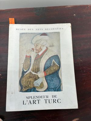 a book with a picture of a man smoking a pipe