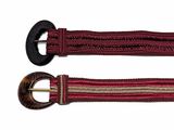 pair of red and brown belts with metal buckles on a white background