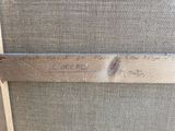 a close up of a piece of wood with writing on it