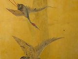 painting of two birds flying in the sky on a yellow background