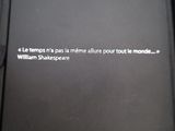 a black door with a quote written on it