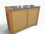 a wooden cabinet with two bowls on top of it