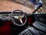 the interior of a car with a steering wheel and dashboard