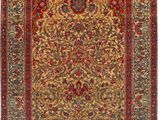 un tapis rouge et or orné d'un motif floral