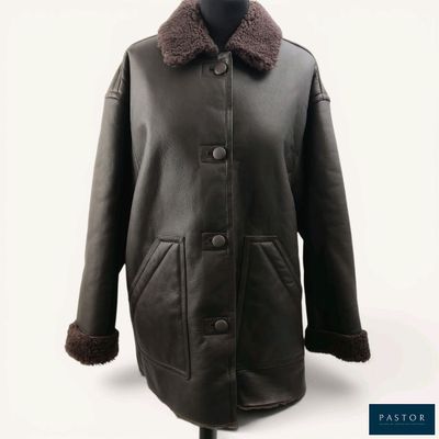 a picture of a brown leather jacket with a fur collar