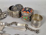 a lot of silver items that are on the table