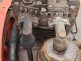 a close up of an old engine on a machine