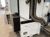a machine that is sitting inside of a building