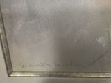 someone is writing on the glass of an oven door in a kitchen