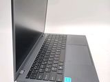 a laptop that is sitting on a white table