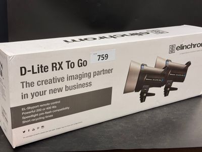 packaging of a black and white photo of a camera and a box