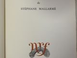 an open book with a picture of a bird on the cover