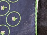 a close up of a tie with buttons on it