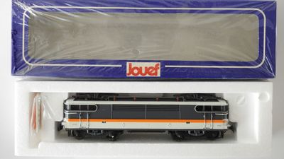 an image of a toy train is in a plastic box