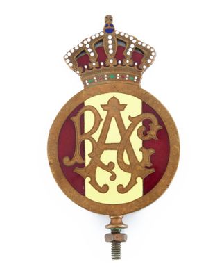 une image représentant un insigne surmonté d'une couronne