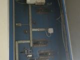 a picture of a blue box with a bunch of wires in it
