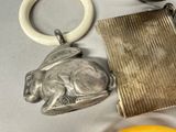 a keychain and a purse on a table