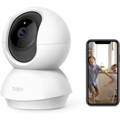 une image représentant un appareil photo blanc à côté d'un téléphone