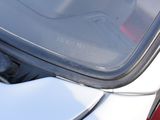 a close up of a car ' s hood with the hood open