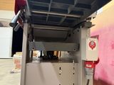 a machine that is sitting on the floor in the room