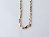 a gold chain necklace with a long link on a white background