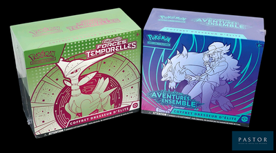 two boxes of pokemon trading cards on a black background