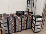 a lot of boxes that are stacked up in a room