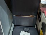 an image of a black and silver toilet in a store