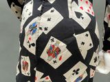an image of a woman ' s dress with playing cards all over it
