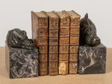 a few books that are sitting on top of each other